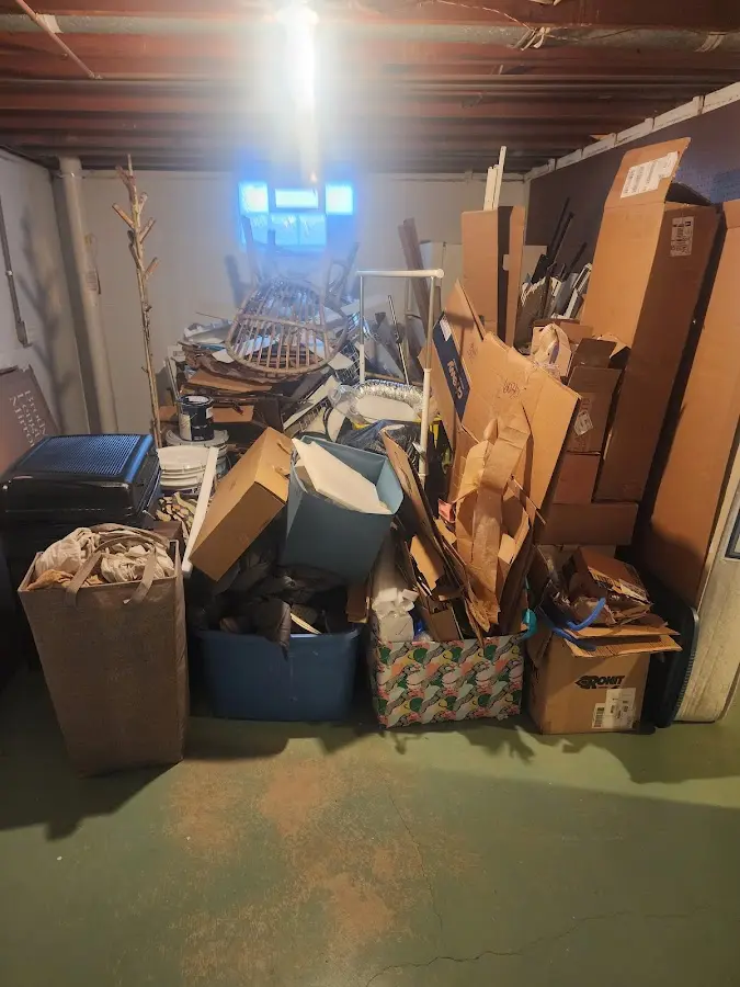 Roll-off dumpster container at job site for 15 Yard Dumpster Rental in Goulding